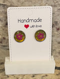 Handmade Glitter Resin Studs with Pink Flower Decal and Glittery Yellow/Gold Background. Perfect gift for a special occasion.
